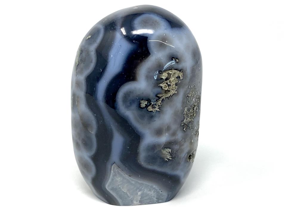 Blue chalcedony agate crystal freeform shape with banded agate patterns and clear quartz crystals