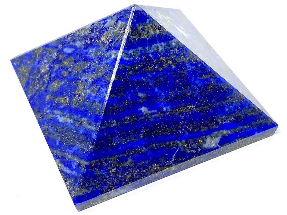 Blue lapis lazuli crystal pyramid with gold stripes of pyrite