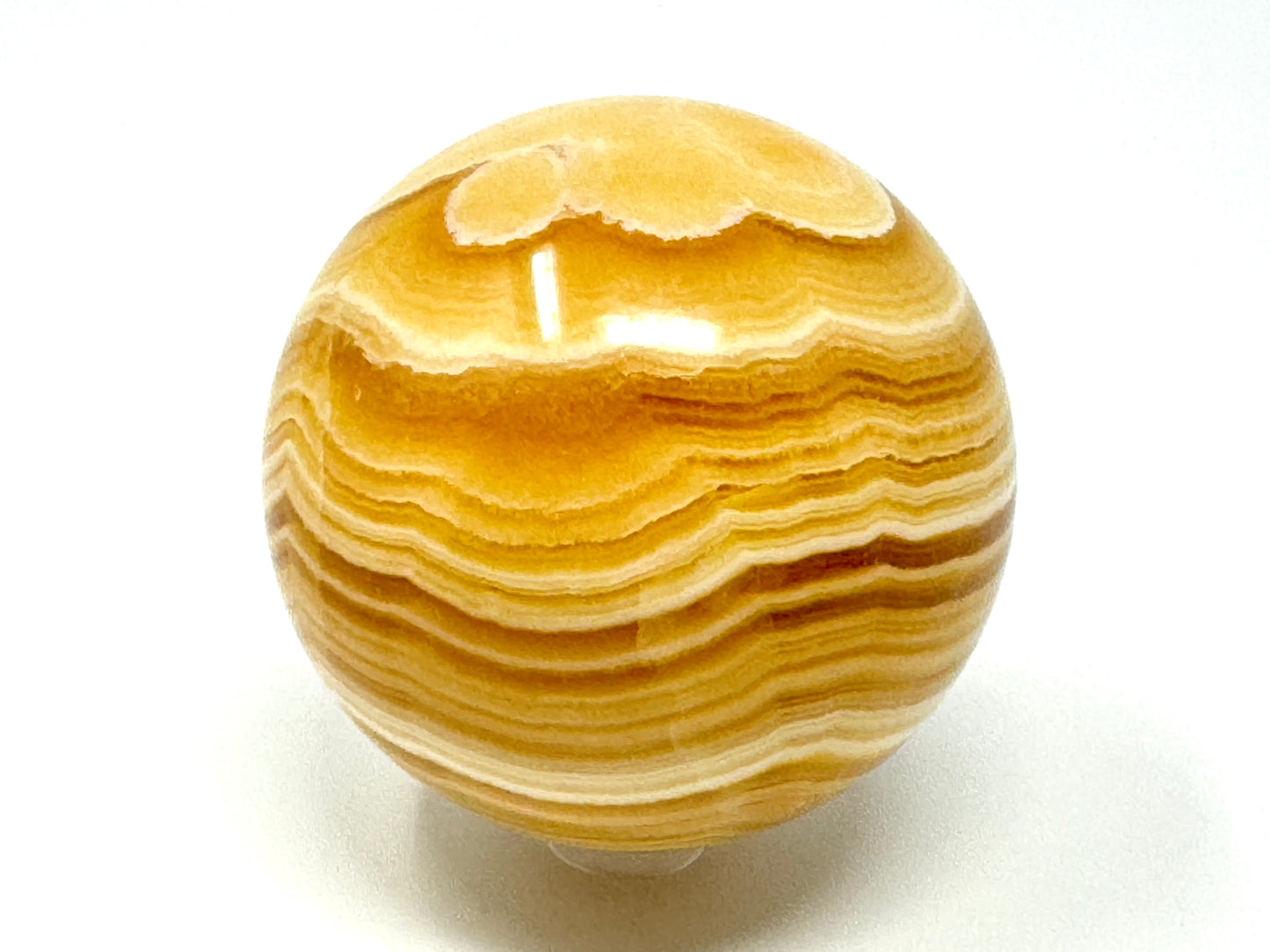 Banded Orange Calcite Crystal Sphere 6.7cm