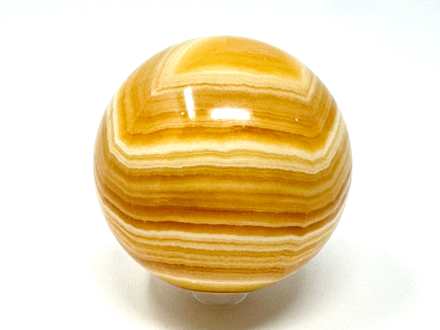 Banded Orange Calcite Crystal Sphere 6.7cm