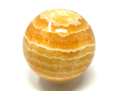 Banded Orange Calcite Crystal Sphere 6.7cm