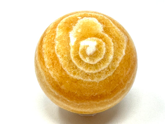 Banded Orange Calcite Crystal Sphere 6.7cm