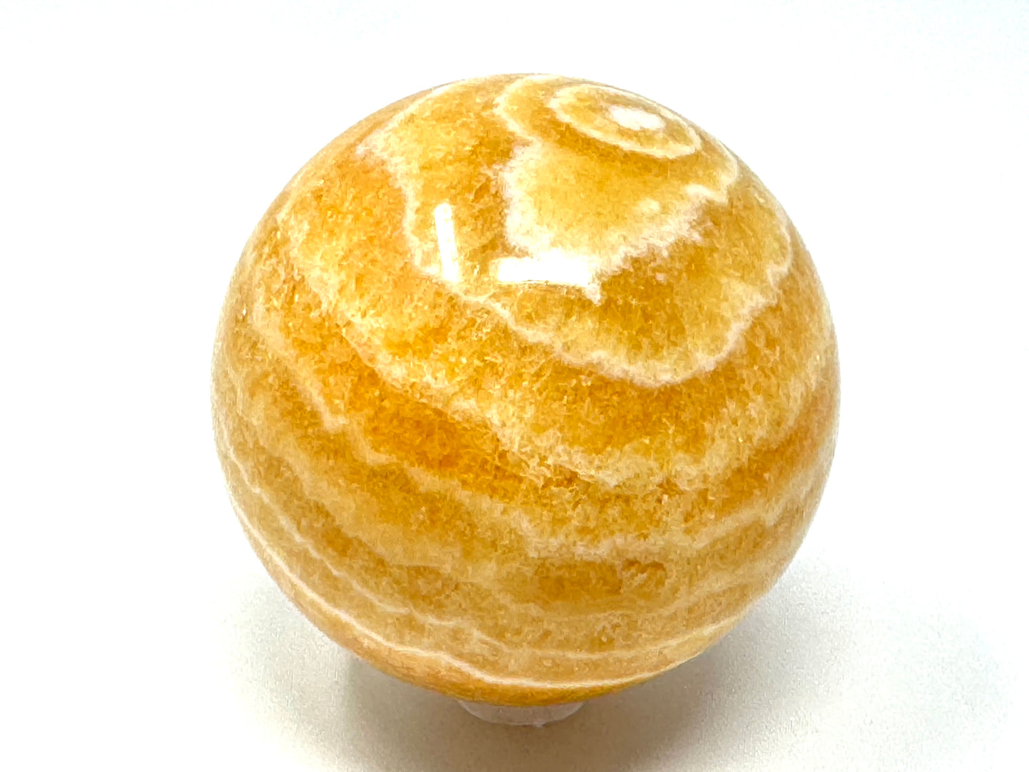 Banded Orange Calcite Crystal Sphere 6.7cm