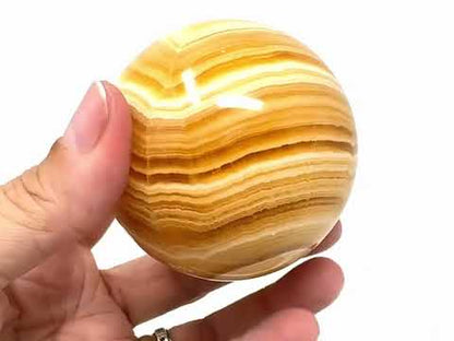 Banded Orange Calcite Crystal Sphere 6.7cm