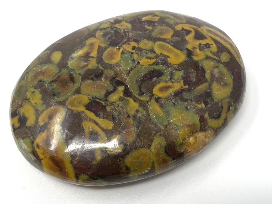 Fruit Jasper Flat Pebble 6.1cm | Image 1
